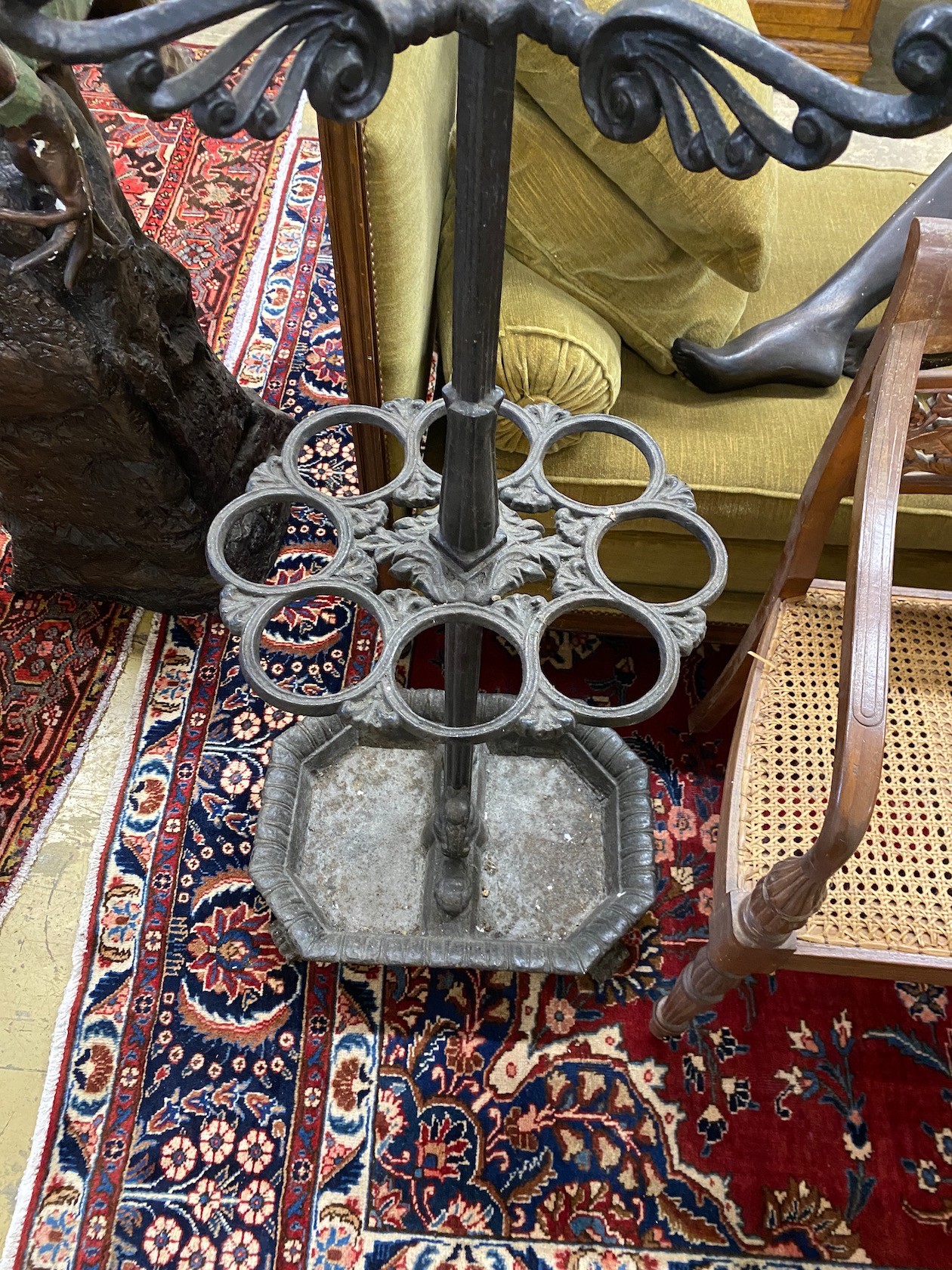 A Victorian style painted cast iron coat and stick stand, height 182cm